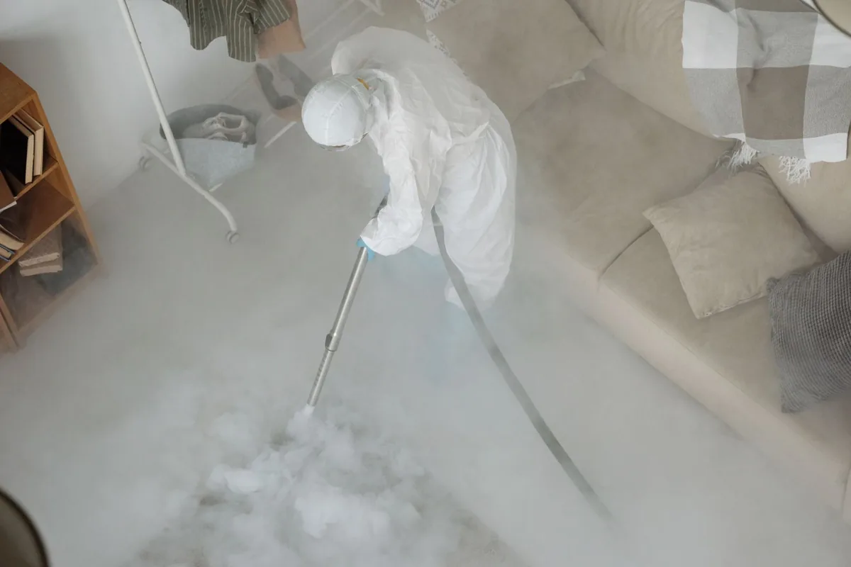Biohazard cleanup technician in protective equipment, Lucerne Valley, CA